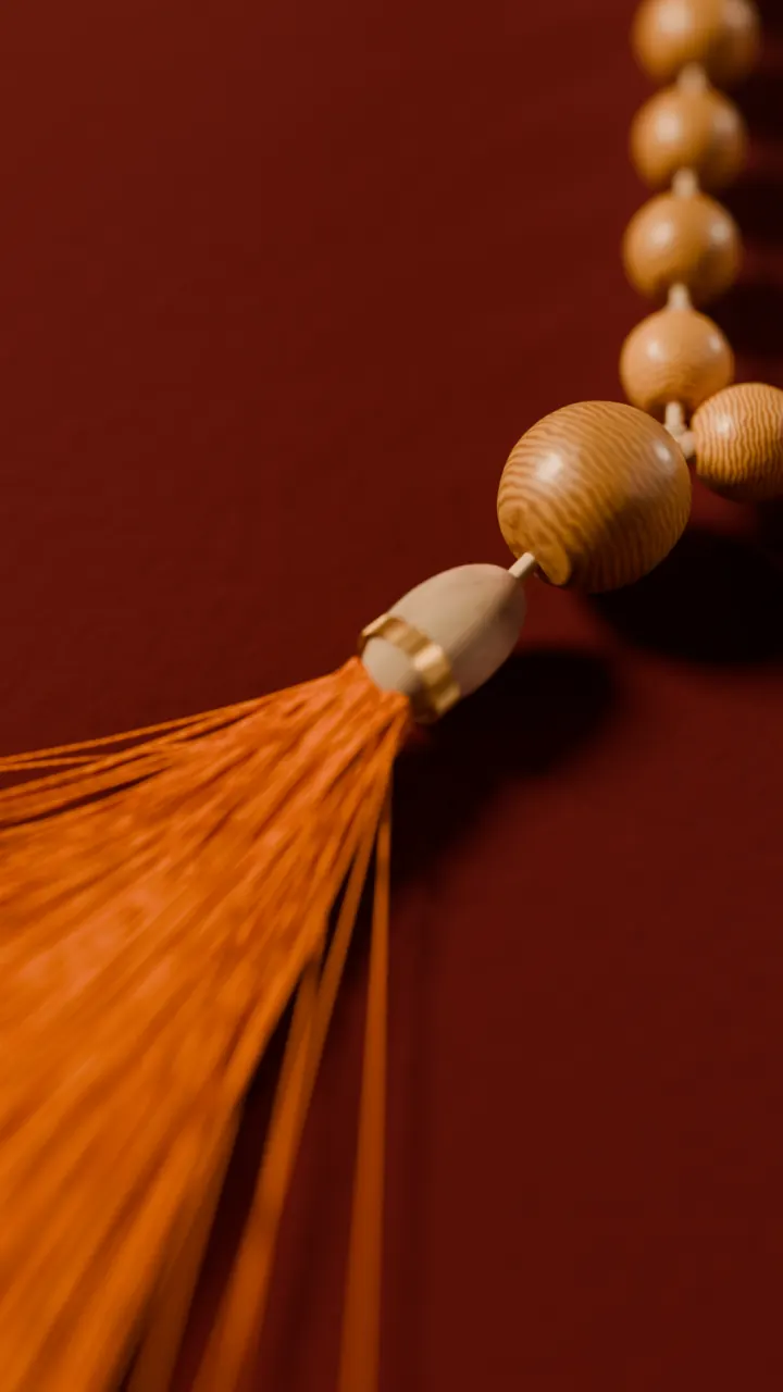 The sumeru and tassel of a tulsi mala